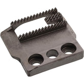 A black feed dog component for a Bernina sewing machine.